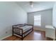 Bedroom showcasing natural light, laminate floors, and a trundle bed at 5426 Astor St, Leesburg, FL 34748