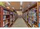 Community library with rows of books, and carpet flooring at 5426 Astor St, Leesburg, FL 34748