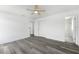 Bright bedroom with a glimpse into the bathroom and its marble wall tiles at 5642 Chukar Dr, Orlando, FL 32810