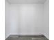 Walk-in closet featuring gray wood-look flooring, and bright white walls at 5642 Chukar Dr, Orlando, FL 32810