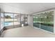 The screened-in patio features a cat door and sliding glass door entrance into the home at 5642 Chukar Dr, Orlando, FL 32810