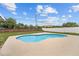 Backyard kidney-shaped pool for cooling off on hot days at 5642 Chukar Dr, Orlando, FL 32810