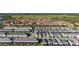 Real estate aerial view of the residential community with a clear view of the houses at 7184 Oakmoss Loop, Davenport, FL 33837