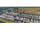 Real estate aerial view of the residential community with a clear view of the houses at 7184 Oakmoss Loop, Davenport, FL 33837