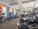 Well-lit community gym featuring modern weight training and various machines at 7184 Oakmoss Loop, Davenport, FL 33837
