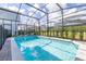 This is a private screened-in pool that offers a refreshing retreat in a relaxing outdoor setting at 7184 Oakmoss Loop, Davenport, FL 33837