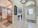 Inviting foyer with views of the bathroom and bedroom, showcasing the home's layout at 8019 Indian Creek Blvd, Kissimmee, FL 34747