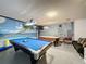 Finished basement features a rec room with two pool tables at 8019 Indian Creek Blvd, Kissimmee, FL 34747