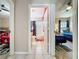 Hallway featuring views of two bedrooms and a bathroom, highlighting the layout of the home at 8019 Indian Creek Blvd, Kissimmee, FL 34747