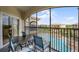 Relaxing balcony overlooking the pool area, perfect for outdoor dining at 8601 Worldquest Blvd # B1/U3502, Orlando, FL 32821