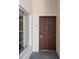 Condo front door with sidelight window and unit number at 8601 Worldquest Blvd # B1/U3502, Orlando, FL 32821