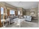 Bright and airy living room with large windows at 8601 Worldquest Blvd # B1/U3502, Orlando, FL 32821