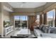 Cozy living room with comfortable seating and a view of the balcony at 8601 Worldquest Blvd # B1/U3502, Orlando, FL 32821