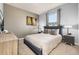 Comfortable bedroom featuring a well-styled bed, soft lighting, neutral color palette, and a large window at 971 Paradise Dr, Davenport, FL 33897