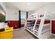 Charming bedroom featuring a playful theme, bunk beds, and plenty of natural light at 971 Paradise Dr, Davenport, FL 33897