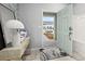 Welcoming foyer featuring stylish decor, ample natural light, and a view of the well-maintained front yard at 971 Paradise Dr, Davenport, FL 33897