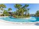 Relaxing lazy river with island feature, perfect for a laid-back day at 971 Paradise Dr, Davenport, FL 33897