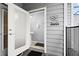 Pool bathroom features a vanity sink and is conveniently accessible from the outdoor patio at 971 Paradise Dr, Davenport, FL 33897