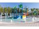 Delightful splash pad with slides and fountains, creating a vibrant and joyful water playground for  at 971 Paradise Dr, Davenport, FL 33897