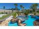A vibrant water feature in the community features life-sized metallic turtles and lush landscaping at 971 Paradise Dr, Davenport, FL 33897