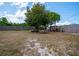 This spacious, partially-fenced backyard offers plenty of room for outdoor activities and gatherings at 987 Trumbull St, Deltona, FL 32725
