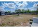 This large, partially-fenced backyard provides ample space for recreation and outdoor enjoyment at 987 Trumbull St, Deltona, FL 32725