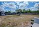 Enjoy this expansive partially-fenced backyard providing abundant space for outdoor activities and relaxation at 987 Trumbull St, Deltona, FL 32725