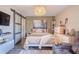 Cozy bedroom with barn door, stylish décor, and soft lighting at 987 Trumbull St, Deltona, FL 32725