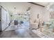 Open-concept living area with modern décor, stylish furniture, and natural light at 987 Trumbull St, Deltona, FL 32725