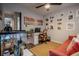 Home office featuring a futon, eclectic gallery wall, desk, and unique decorations at 987 Trumbull St, Deltona, FL 32725