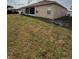 Large backyard with partially shaded area, ideal for relaxing and enjoying nature at 1029 Dampierre Ct, Kissimmee, FL 34759