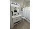 Bright bathroom featuring a modern vanity, a toilet, and tiled floors, creating a functional space at 1029 Dampierre Ct, Kissimmee, FL 34759
