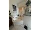 Bathroom featuring a soaking tub and a decorative elephant print at 1029 Dampierre Ct, Kissimmee, FL 34759