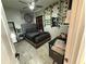 Cozy bedroom with a gray bed frame, mandala tapestry, and ceiling fan offers a calm, relaxing retreat at 1029 Dampierre Ct, Kissimmee, FL 34759