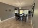 Dining room with decorative light fixture, perfect for intimate dinners and gatherings at 1029 Dampierre Ct, Kissimmee, FL 34759