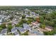 Charming neighborhood with mature trees and well-maintained homes from an aerial view at 1047 Banks Rose St, Kissimmee, FL 34747
