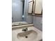 Close-up of bathroom sink with faucet and mirror at 108 Creekside Way, Orlando, FL 32824