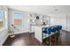 Entertain in the bar area, showcasing stylish seating and counter space, as well as floating shelves for storage at 13136 Alderley Drive Dr, Orlando, FL 32832