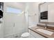 Modern bathroom featuring a glass-enclosed shower with gray tiled flooring and a vanity with a sink at 13136 Alderley Drive Dr, Orlando, FL 32832