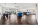 Expansive living room with bar, dining, and entertainment spaces, offering a great view of the outdoors at 13136 Alderley Drive Dr, Orlando, FL 32832
