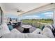 Relaxing covered patio area overlooking lush golf course and community playground at 13136 Alderley Drive Dr, Orlando, FL 32832