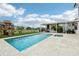 Amazing backyard with pool, hot tub, outdoor kitchen, playground, and ample space for activities at 13136 Alderley Drive Dr, Orlando, FL 32832