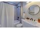 Bathroom featuring a bathtub shower combination and modern fixtures at 1407 Noble Pl, Orlando, FL 32801