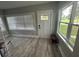 Bright entryway showcases light wood floors, a white door, and views of the front yard at 1407 Noble Pl, Orlando, FL 32801