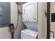 Stacked washer and dryer provides space-saving laundry solution at 1407 Noble Pl, Orlando, FL 32801