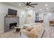 Cozy living room with modern fireplace, comfortable seating, and open floor plan at 1407 Noble Pl, Orlando, FL 32801