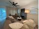 Stylish living room boasts a fireplace, plush seating, and modern decor at 1407 Noble Pl, Orlando, FL 32801