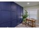 Stylish office with modern desk setup, large windows, and dark wall feature at 1407 Noble Pl, Orlando, FL 32801