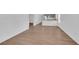 Spacious living room with hardwood floors and an open layout to the kitchen at 1521 Nieuport Ln, Orlando, FL 32805