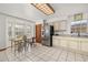 Inviting kitchen area with stainless steel appliances and bay window at 1543 Reade Cir, St Cloud, FL 34772